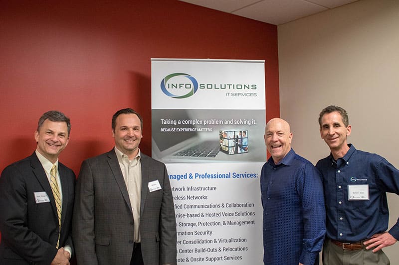 Info Solutions founders with the comedian.